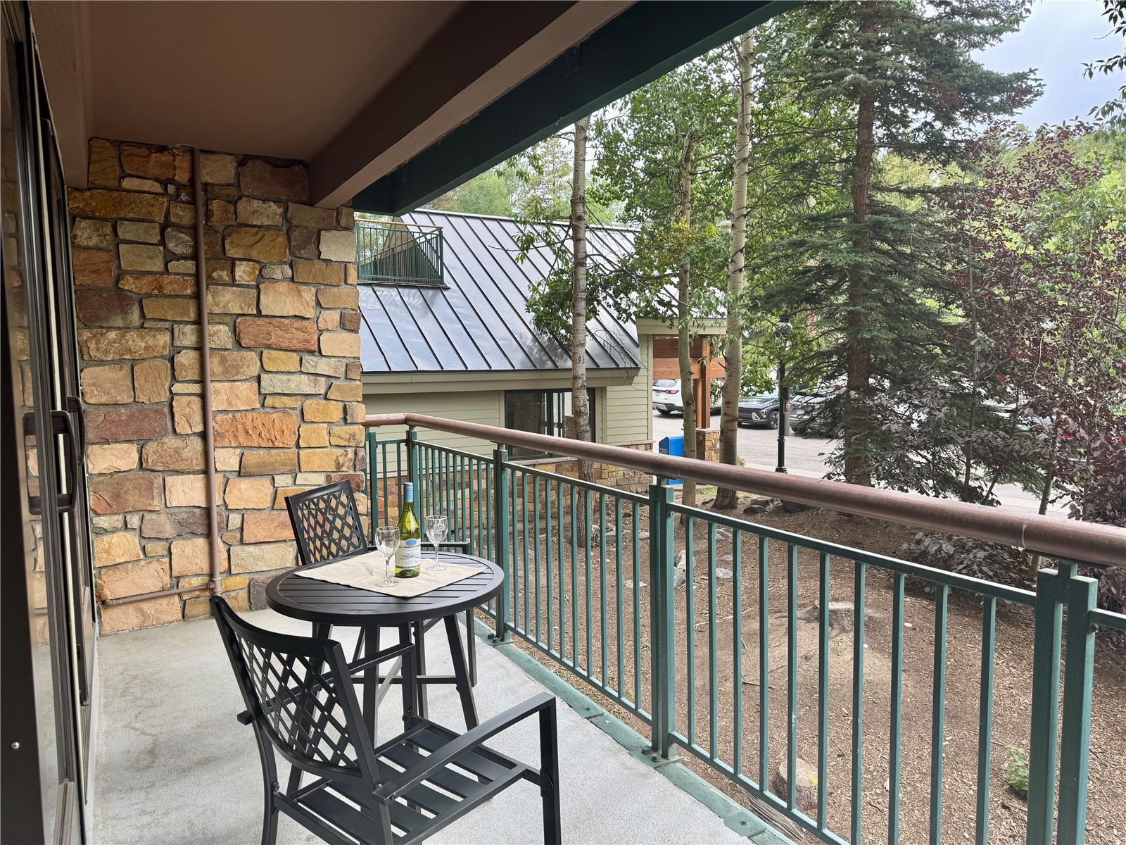 455 Village Road, Unit 103 Breckenridge, CO 80424 - Photo 3 of 50 Balcony faces west for those incredible sunsets.