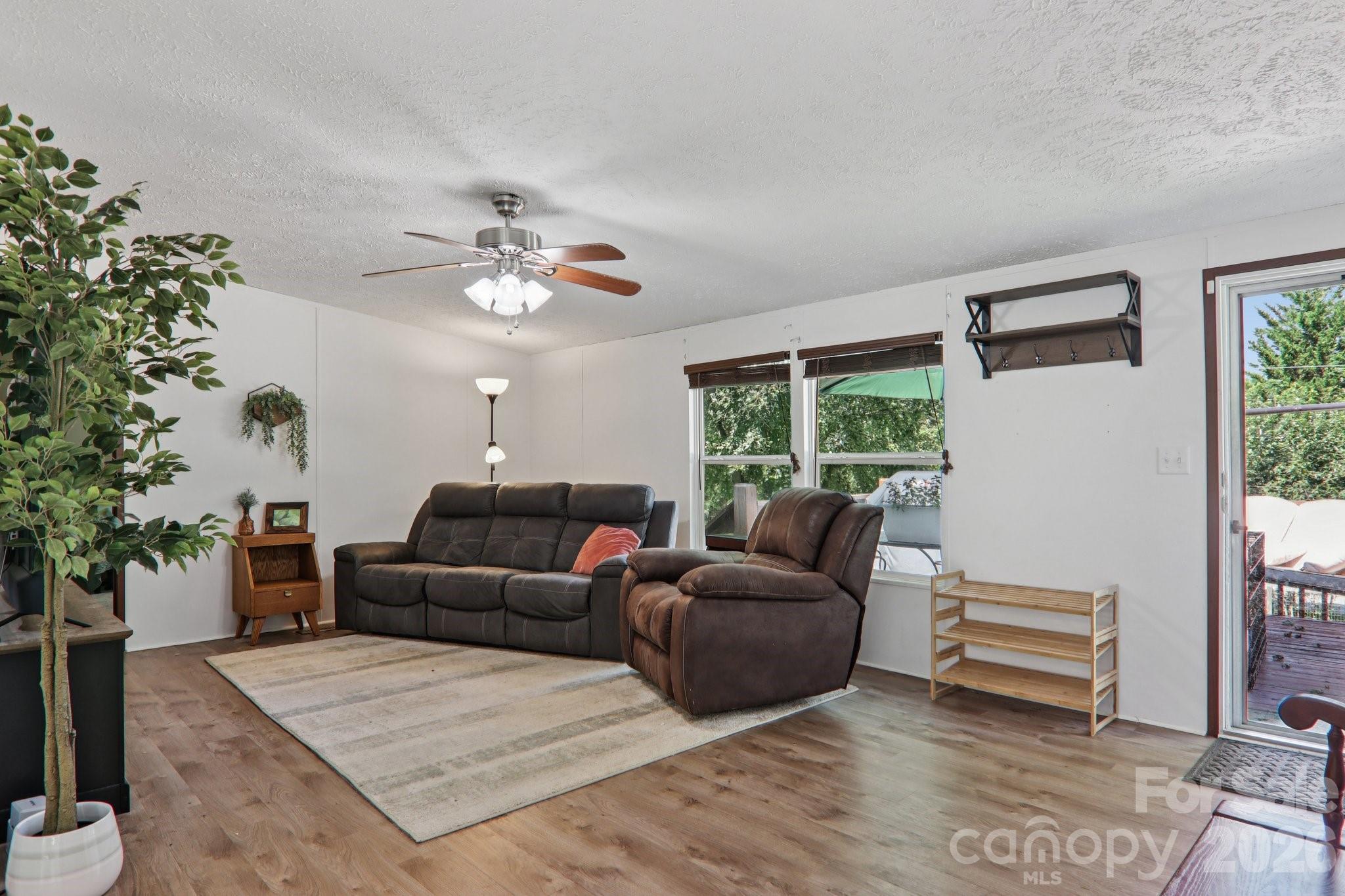 4 Sweet Birch Drive Alexander, NC 28701 - Photo 14 of 48 a living room with furniture and a large window