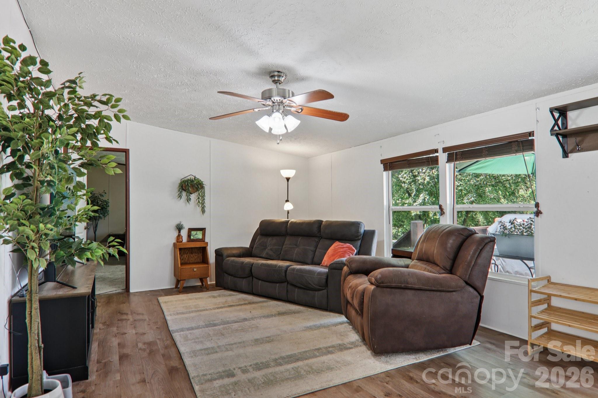 4 Sweet Birch Drive Alexander, NC 28701 - Photo 15 of 48 a living room with furniture and a large window
