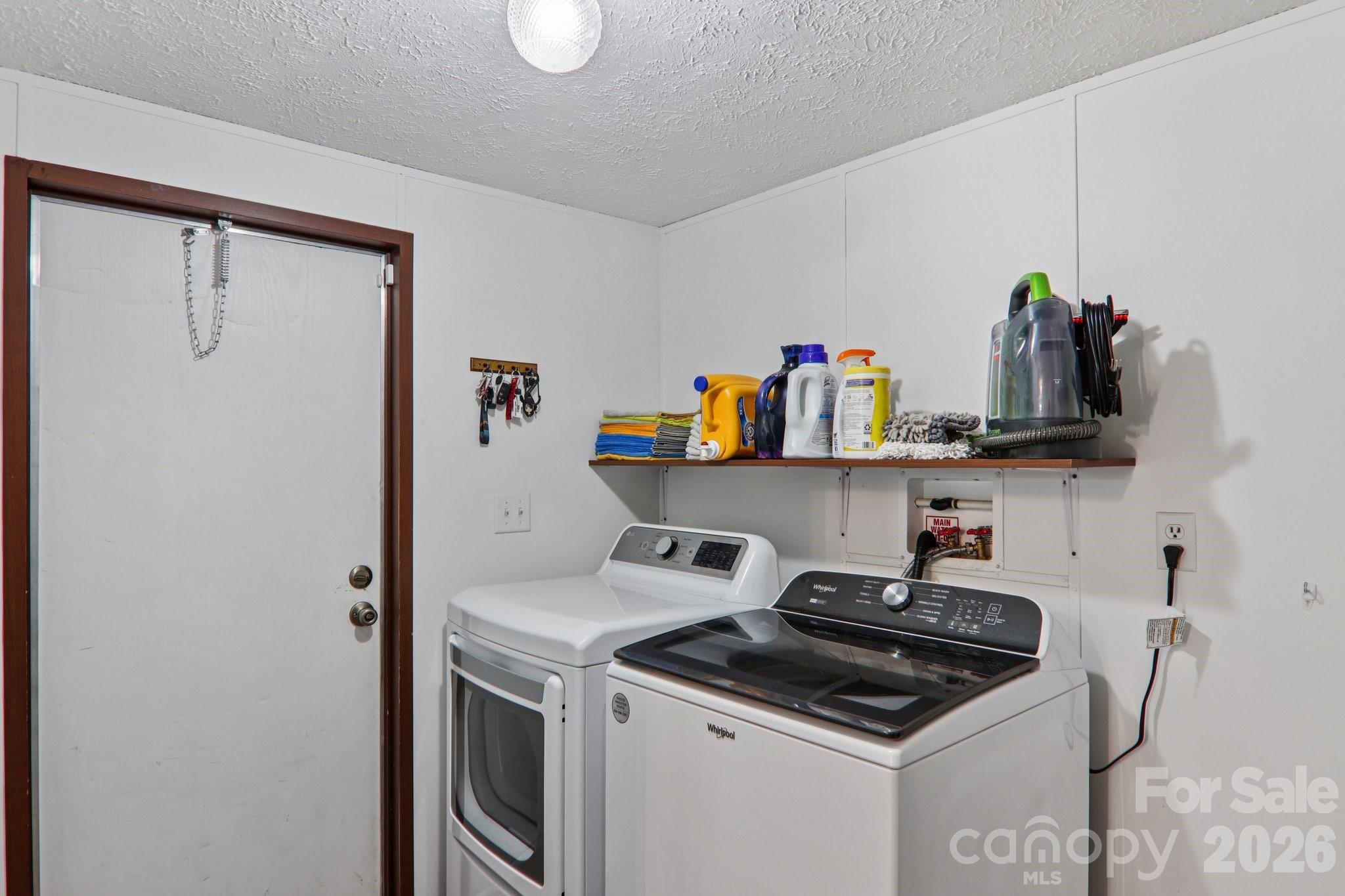 4 Sweet Birch Drive Alexander, NC 28701 - Photo 27 of 48 a kitchen with stainless steel appliances granite countertop a stove and a refrigerator
