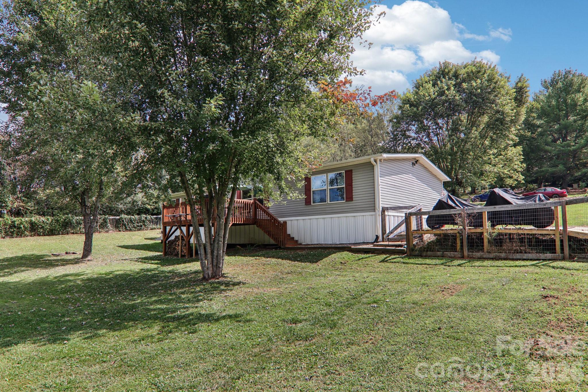 4 Sweet Birch Drive Alexander, NC 28701 - Photo 3 of 48 a view of a house with a yard and sitting area