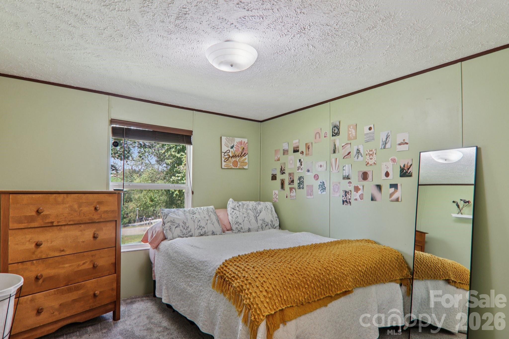 4 Sweet Birch Drive Alexander, NC 28701 - Photo 36 of 48 a bedroom with a bed and a window