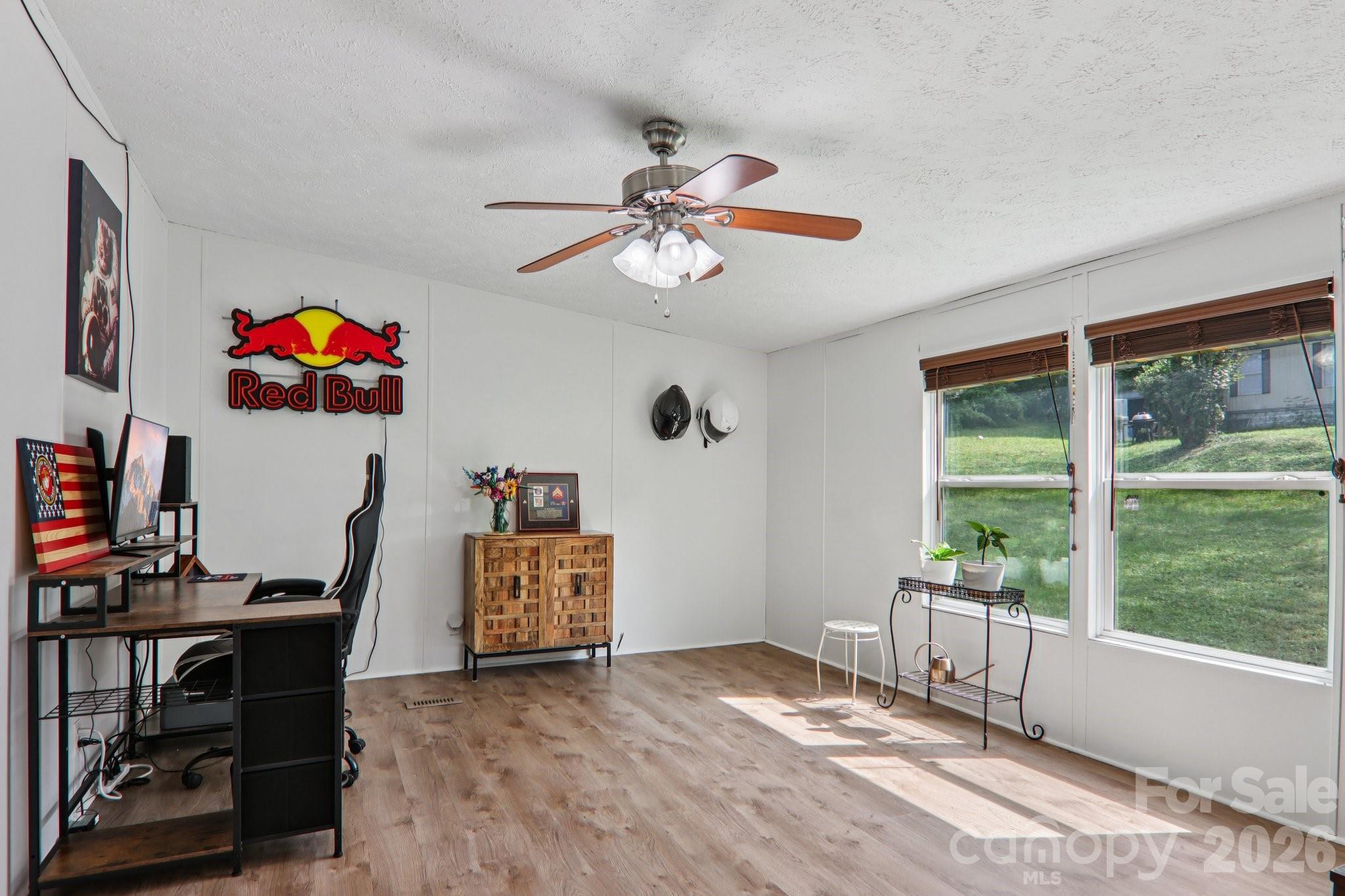 4 Sweet Birch Drive Alexander, NC 28701 - Photo 41 of 48 a workspace with furniture wooden floor and window