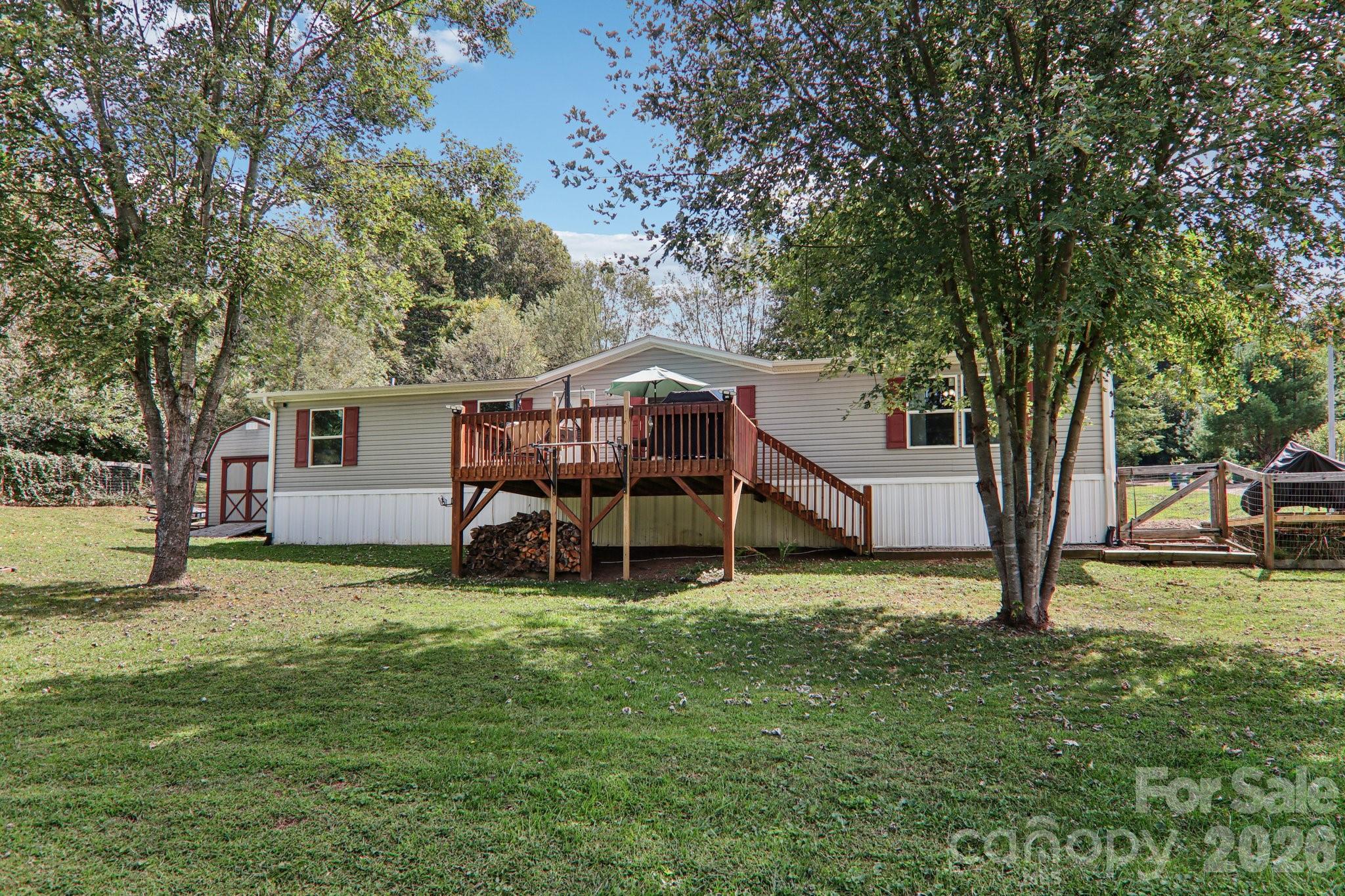 4 Sweet Birch Drive Alexander, NC 28701 - Photo 5 of 48 a view of a house with backyard