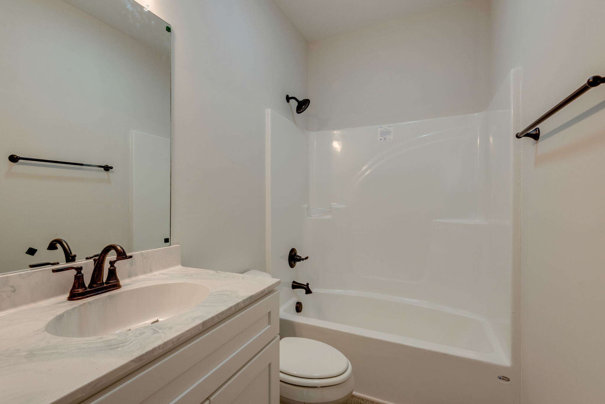 1172 Oak Grove Road Dickson, TN 37055 - Photo 24 of 29 a bathroom with a sink a toilet and a bathtub