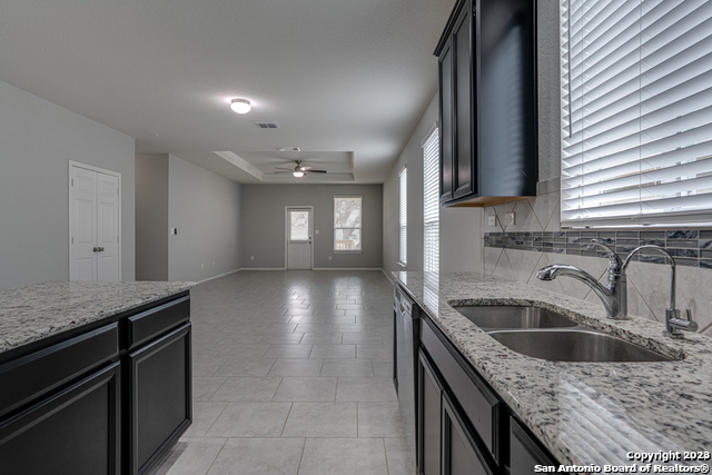 27319 Sterling Silver San Antonio, TX 78260 - Photo 11 of 28 a kitchen with a sink and cabinets