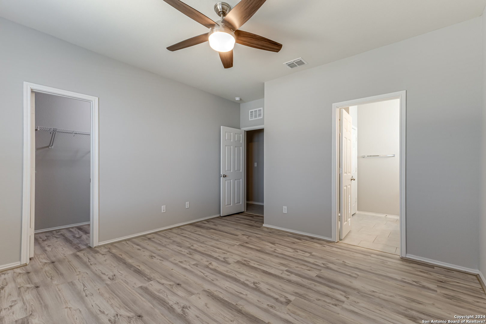 27319 Sterling Silver San Antonio, TX 78260 - Photo 16 of 28 a view of an empty room with wooden floor