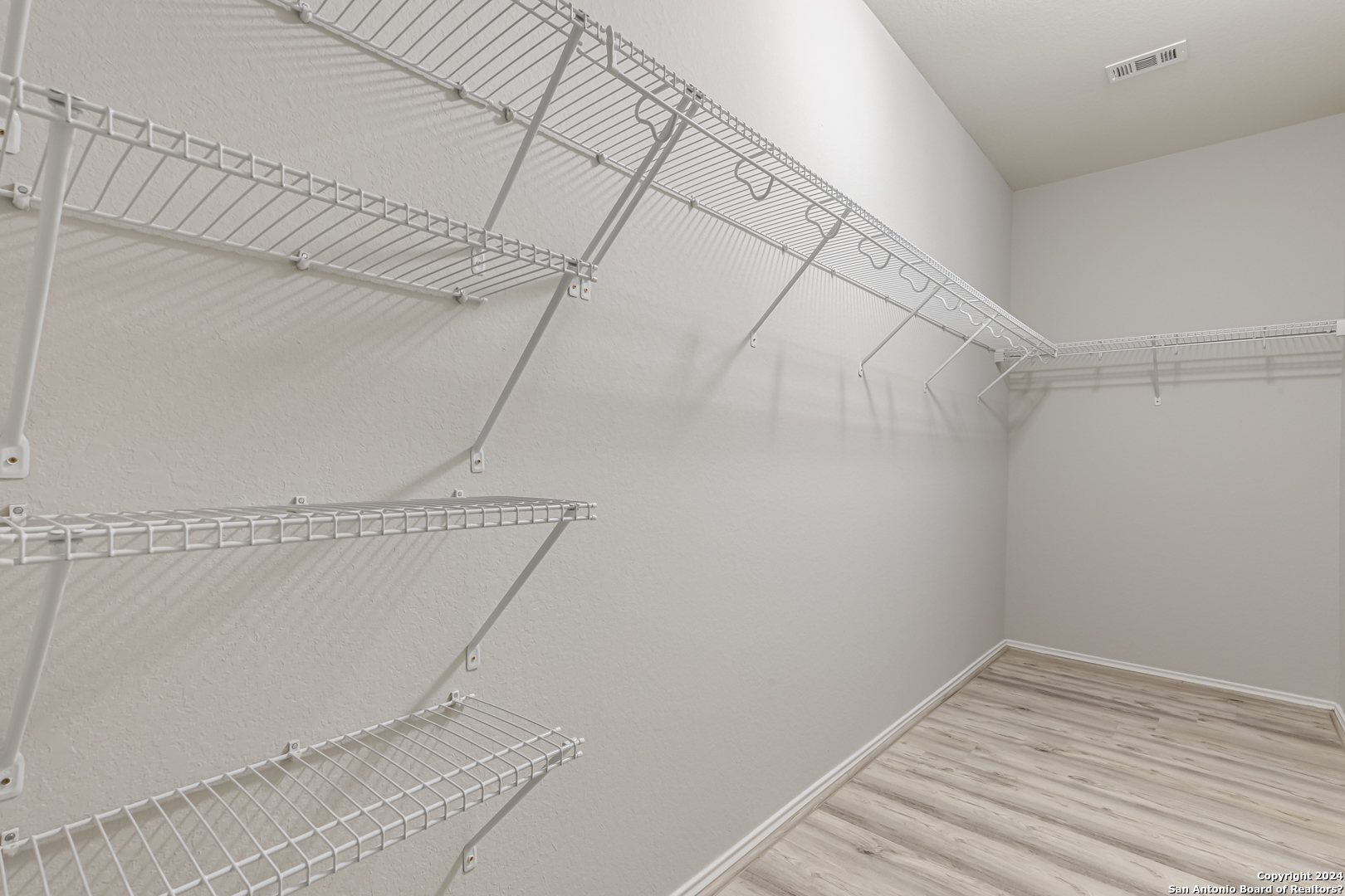 27319 Sterling Silver San Antonio, TX 78260 - Photo 21 of 28 a view of a room with racks on the wall