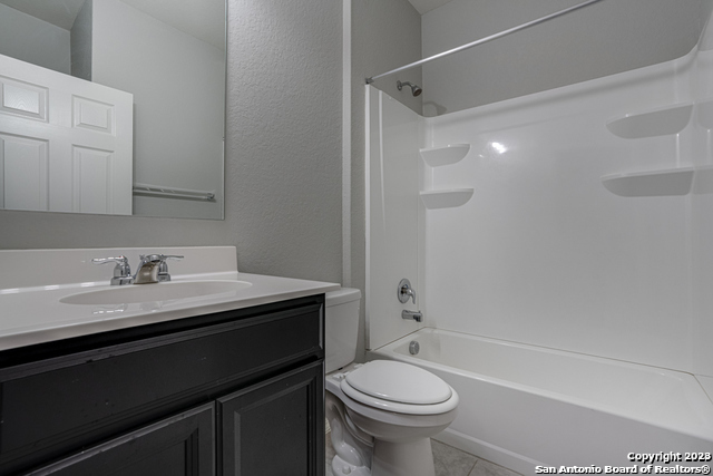 27319 Sterling Silver San Antonio, TX 78260 - Photo 23 of 28 a bathroom with a sink a toilet and shower