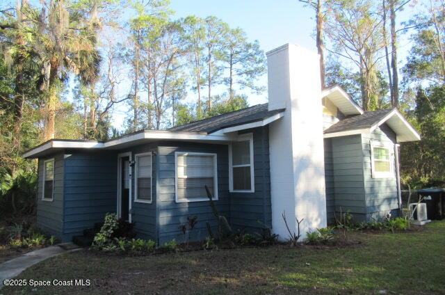 8812 Trevarthon Road Orlando, FL 32817 - Photo 19 of 22 a front view of a house with garden