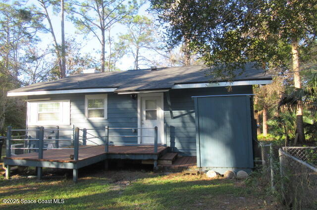 8812 Trevarthon Road Orlando, FL 32817 - Photo 20 of 22 a view of house with yard