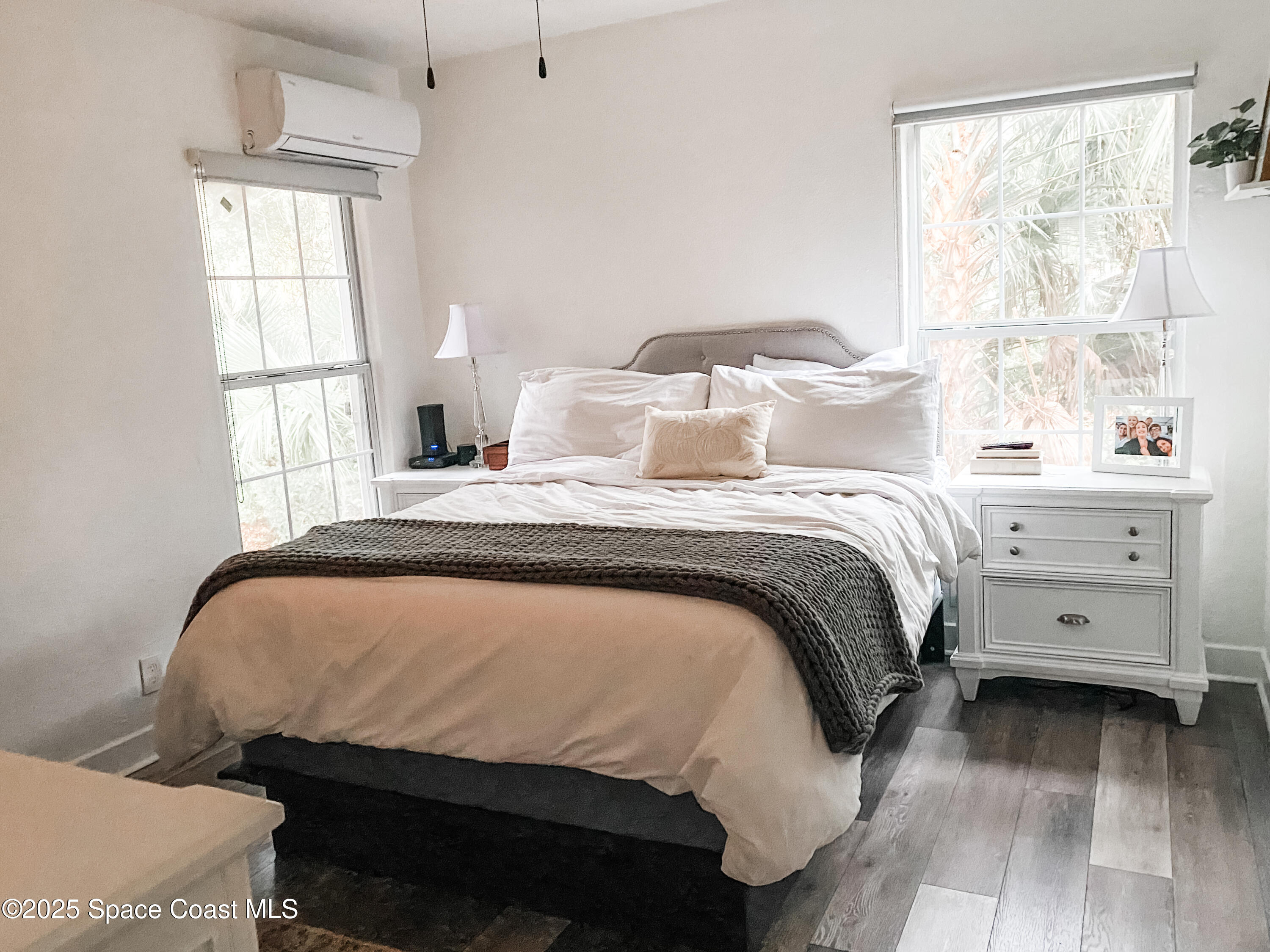 8812 Trevarthon Road Orlando, FL 32817 - Photo 6 of 22 a bedroom with a bed and a window