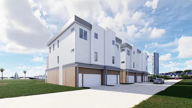 a view of a big room with a big yard and large trees