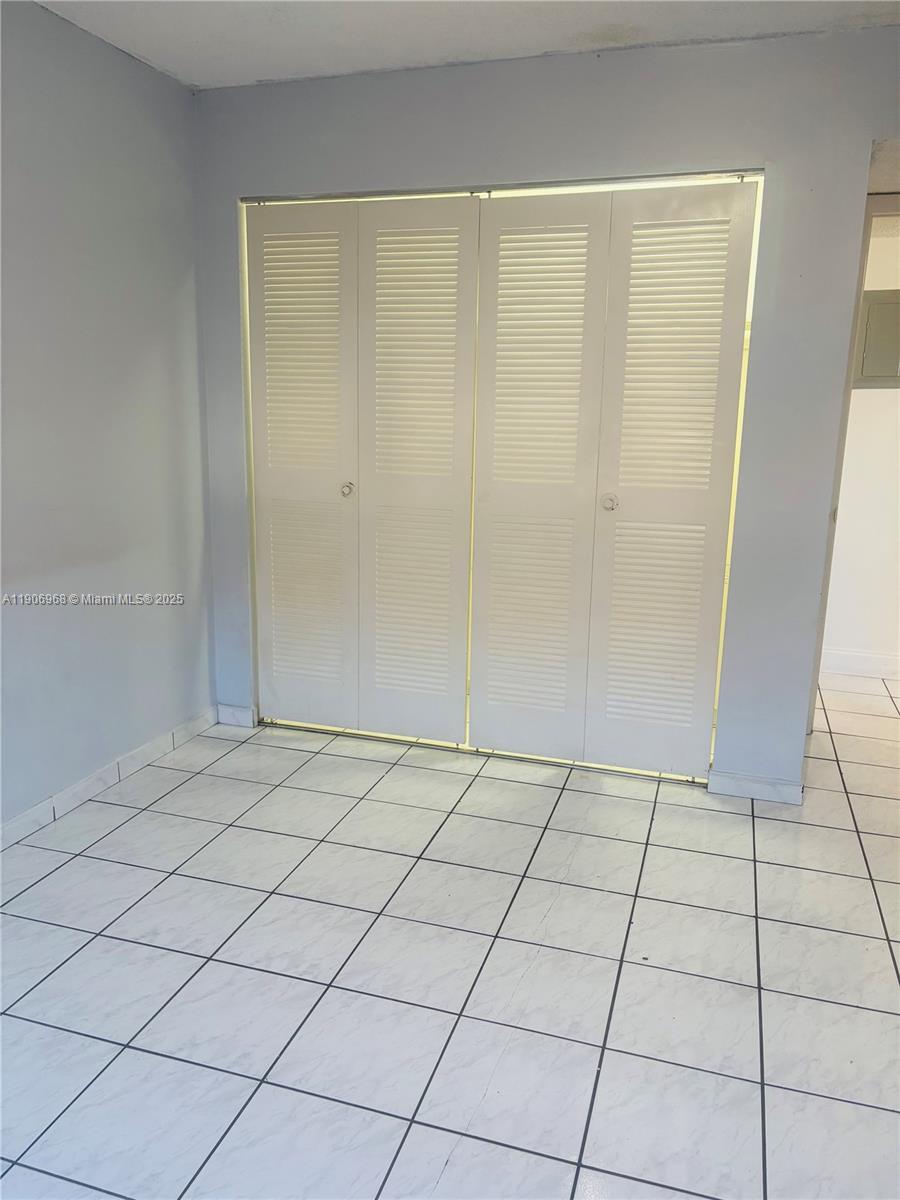 295 Northwest 72nd Avenue, Unit 401 Miami, FL 33126 - Photo 3 of 12 a view of an empty room