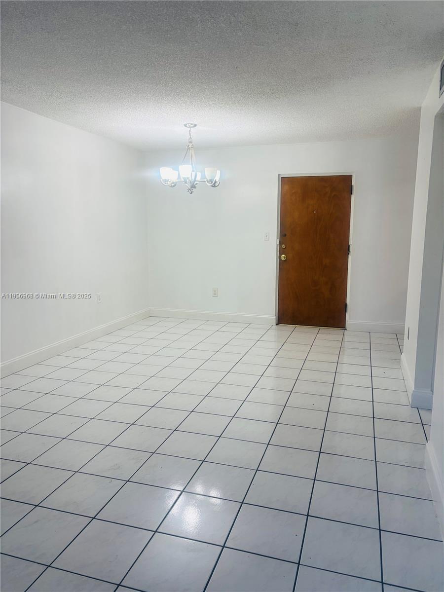 295 Northwest 72nd Avenue, Unit 401 Miami, FL 33126 - Photo 8 of 12 a view of an empty room