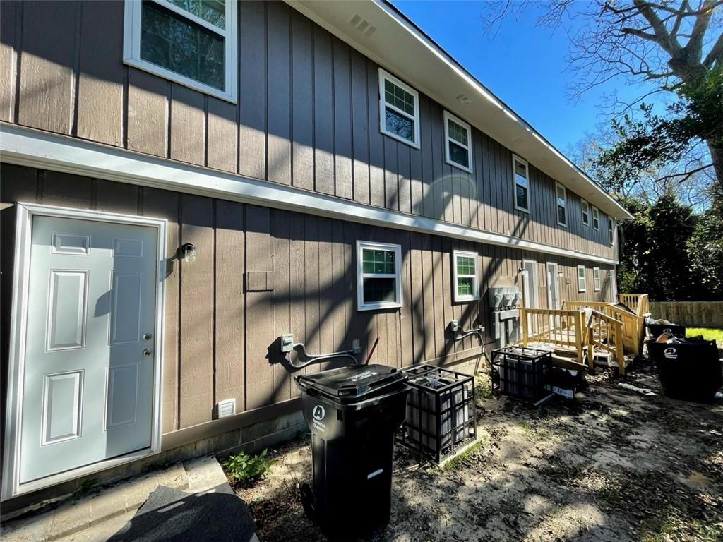 458 Daffodil Street Macon, GA 31204 - Photo 17 of 24 a view of a house with a wooden fence