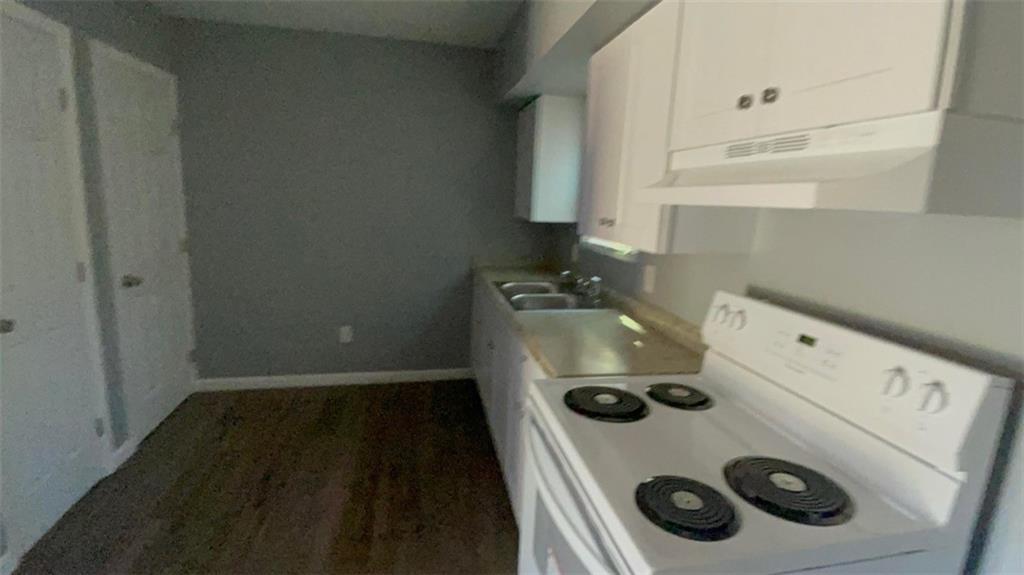 458 Daffodil Street Macon, GA 31204 - Photo 5 of 24 a utility room with dryer and washer