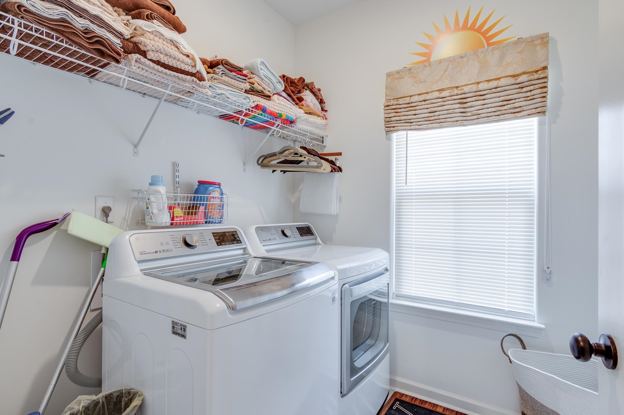 135 Chesnut Rdg Drive Oakland, TN 38060 - Photo 24 of 36 Laundry room with separate washer and dryer and baseboards