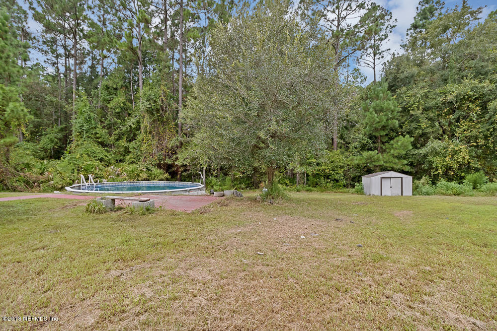 12100 Chester Creek Road Jacksonville, FL 32218 - Photo 19 of 40 Back Yard/ Above Ground Pool