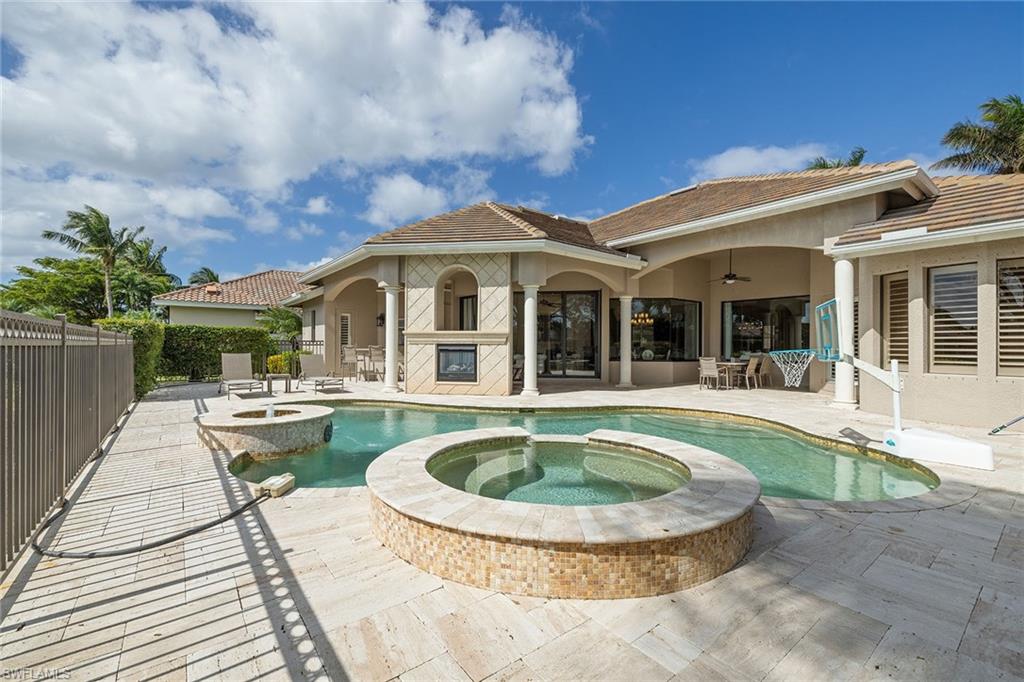 16540 Cellini Lane Naples, FL 34110 - Photo 32 of 50 a view of a house with swimming pool and porch