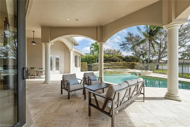 a outdoor space with patio the couches and dining table with garden view