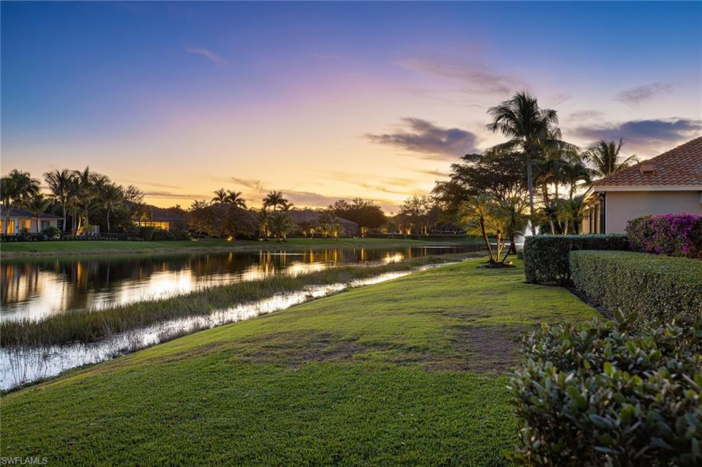 16540 Cellini Lane Naples, FL 34110 - Photo 49 of 50 a view of a lake with a big yard