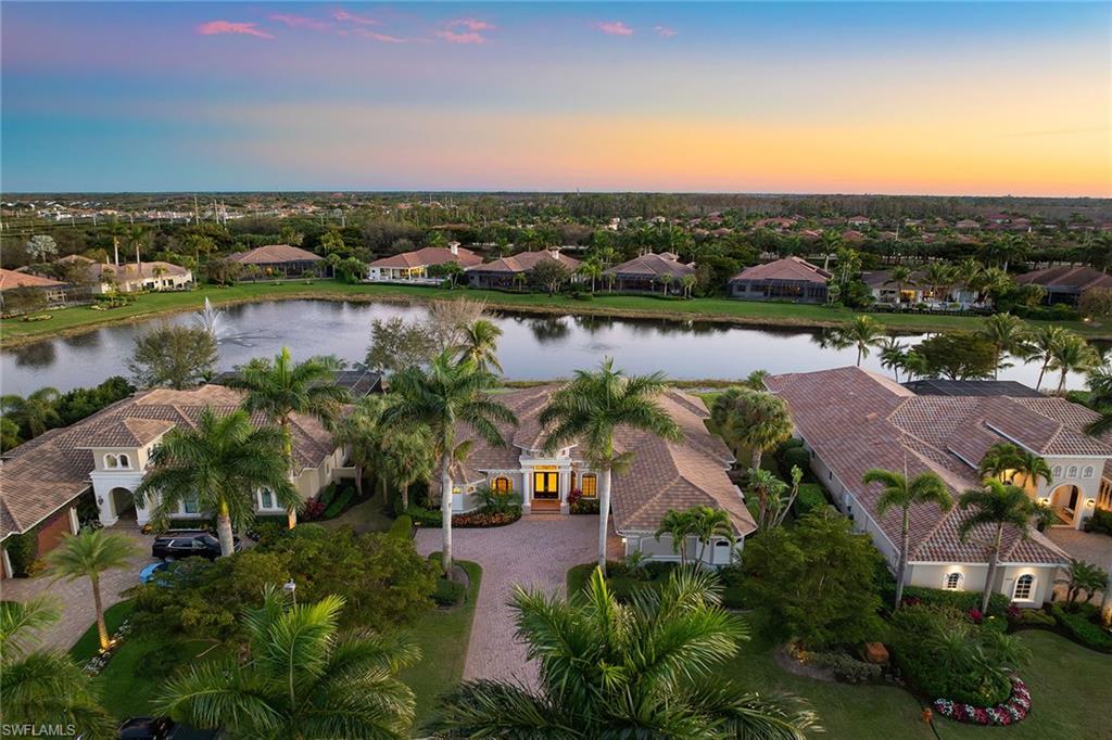 16540 Cellini Lane Naples, FL 34110 - Photo 50 of 50 an aerial view of a city with lake view
