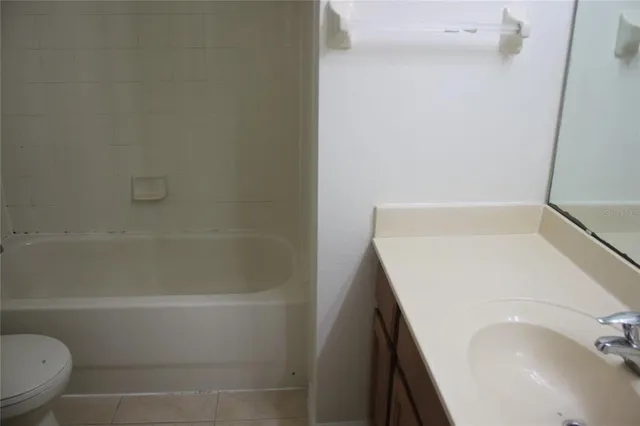 a bathroom with a sink and a vanity