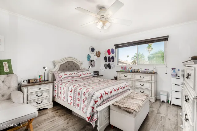 a bedroom with a bed and a dresser