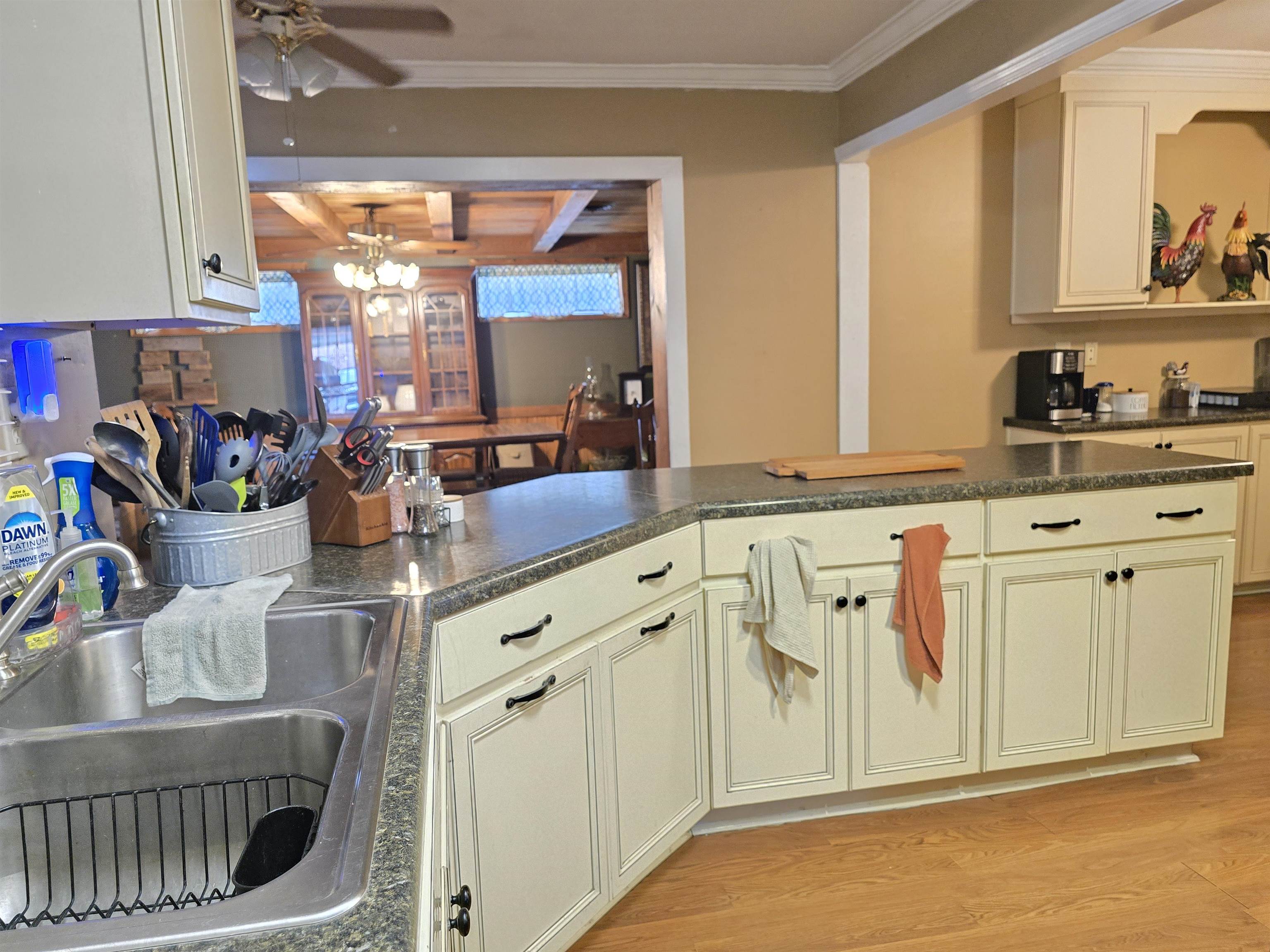 4885 Macon Road Memphis, TN 38122 - Photo 23 of 39 a kitchen with stainless steel appliances granite countertop a sink and cabinets