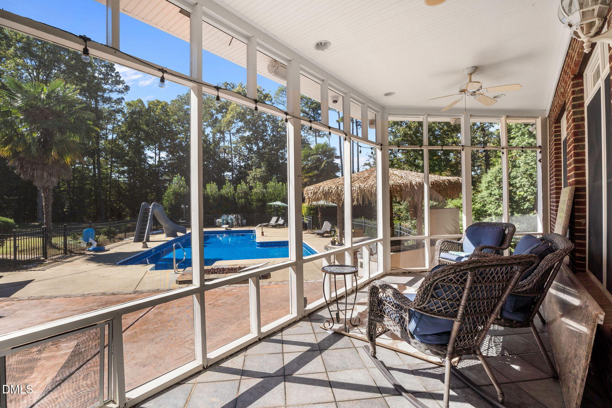 5870 Hoyt Road Middlesex, NC 27557 - Photo 23 of 33 a view of a patio with a table chairs and a backyard