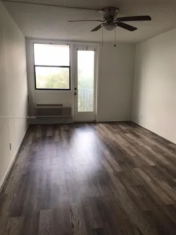 a view of a city street from a balcony