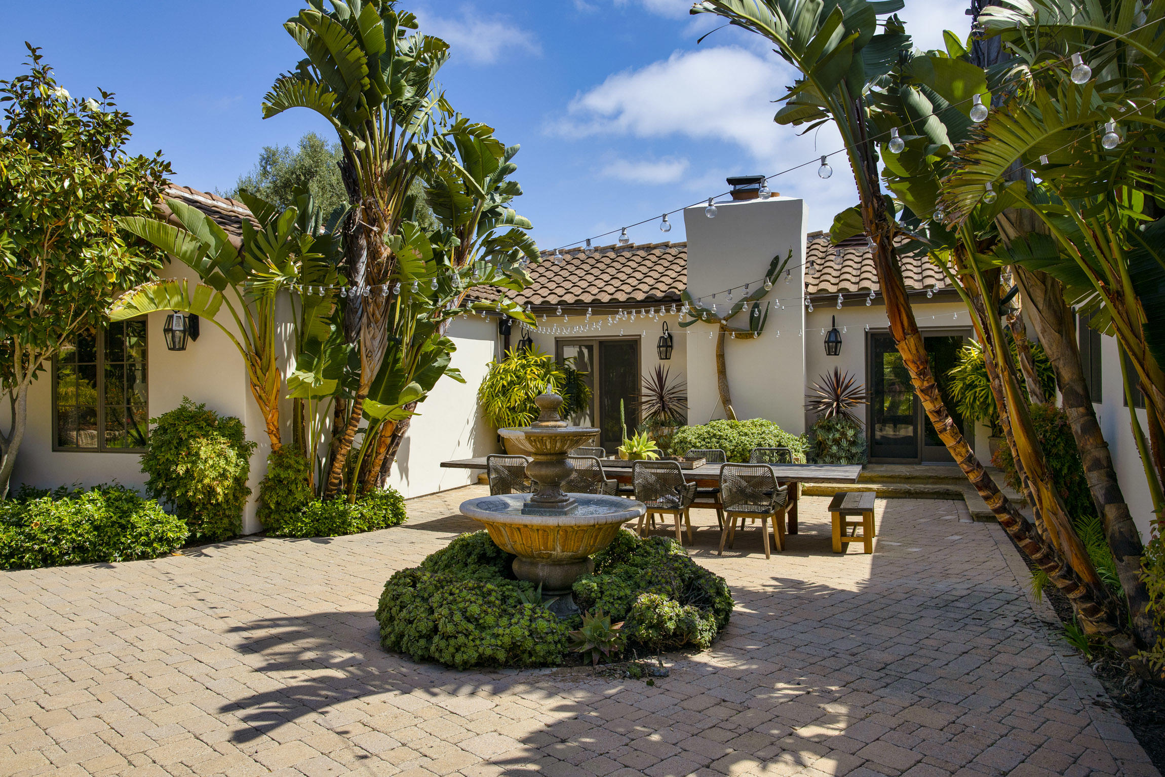 2519 Foothill Lane Santa Barbara, CA 93105 - Photo 31 of 35 a view of a patio with table and chairs and potted plants