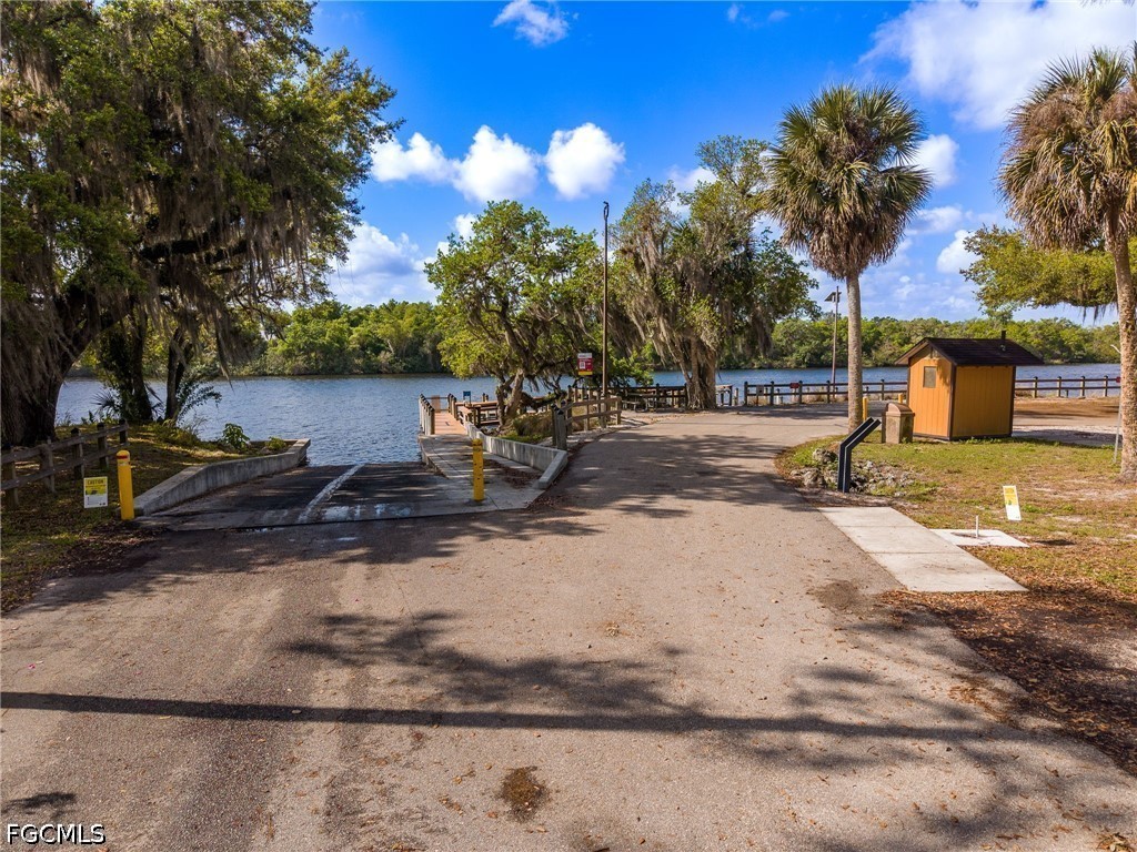 17290 Rewis Road Alva, FL 33920 - Photo 49 of 50 a view of a backyard of a house