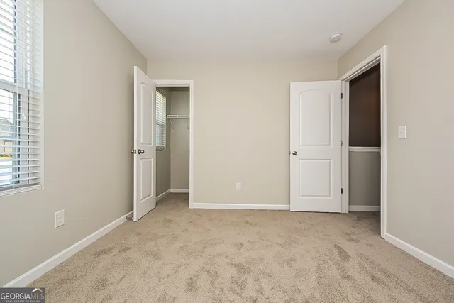 an empty room with closet