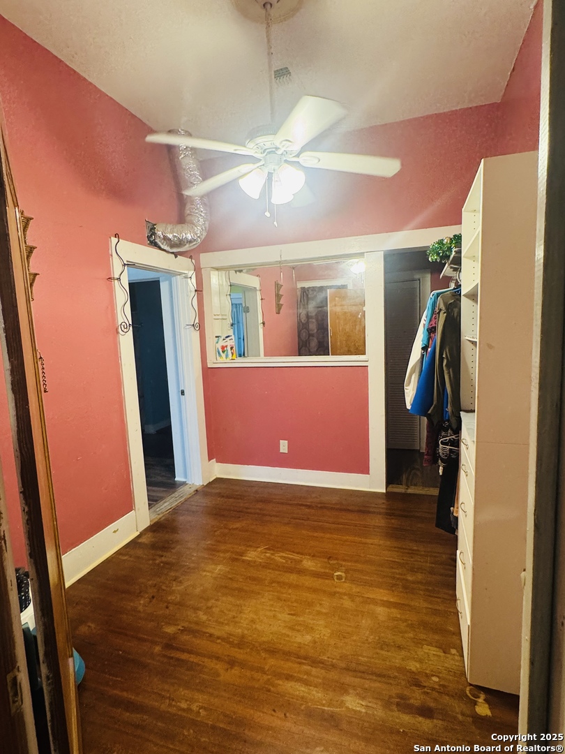 314 Devine Street San Antonio, TX 78210 - Photo 16 of 25 a view of a livingroom with a furniture window and wooden floor