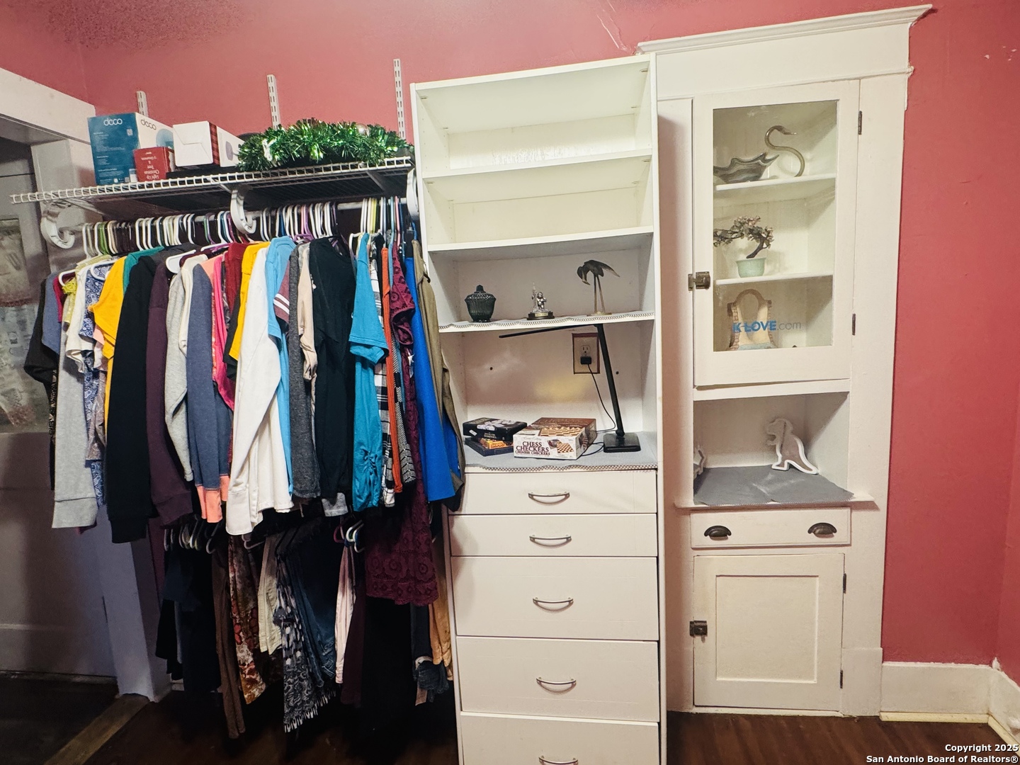 314 Devine Street San Antonio, TX 78210 - Photo 17 of 25 a view of walk in closet with clothes and shoes