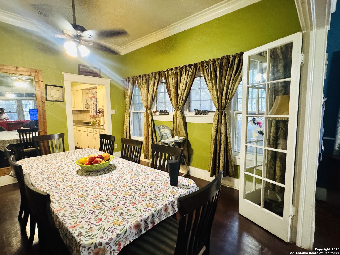 314 Devine Street San Antonio, TX 78210 - Photo 10 of 25 a view of a dining room with furniture and wooden floor