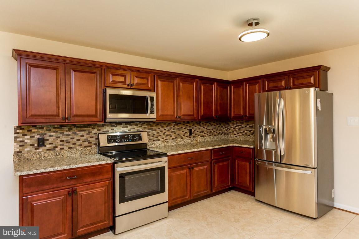 373 Cropp Road Fredericksburg, VA 22406 - Photo 2 of 30 Kitchen features granite counters, new appliances