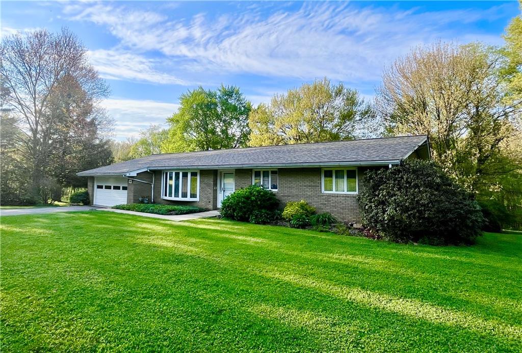 143 Schnur Road Butler, PA 16002 - Photo 14 of 50 a view of a house with a garden