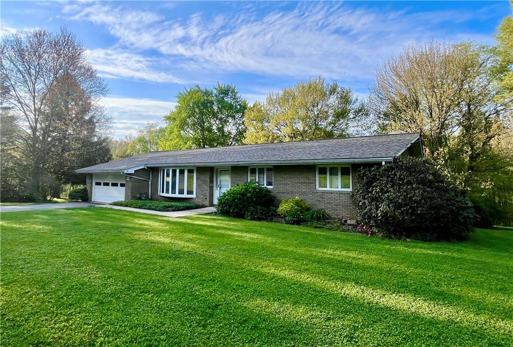 143 Schnur Road Butler, PA 16002 - Photo 2 of 50 a view of a house with a garden
