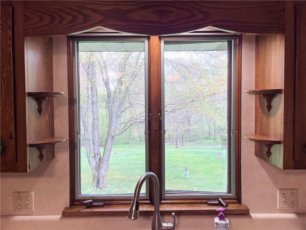 143 Schnur Road Butler, PA 16002 - Photo 21 of 50 a view of a room that has a bed and a window