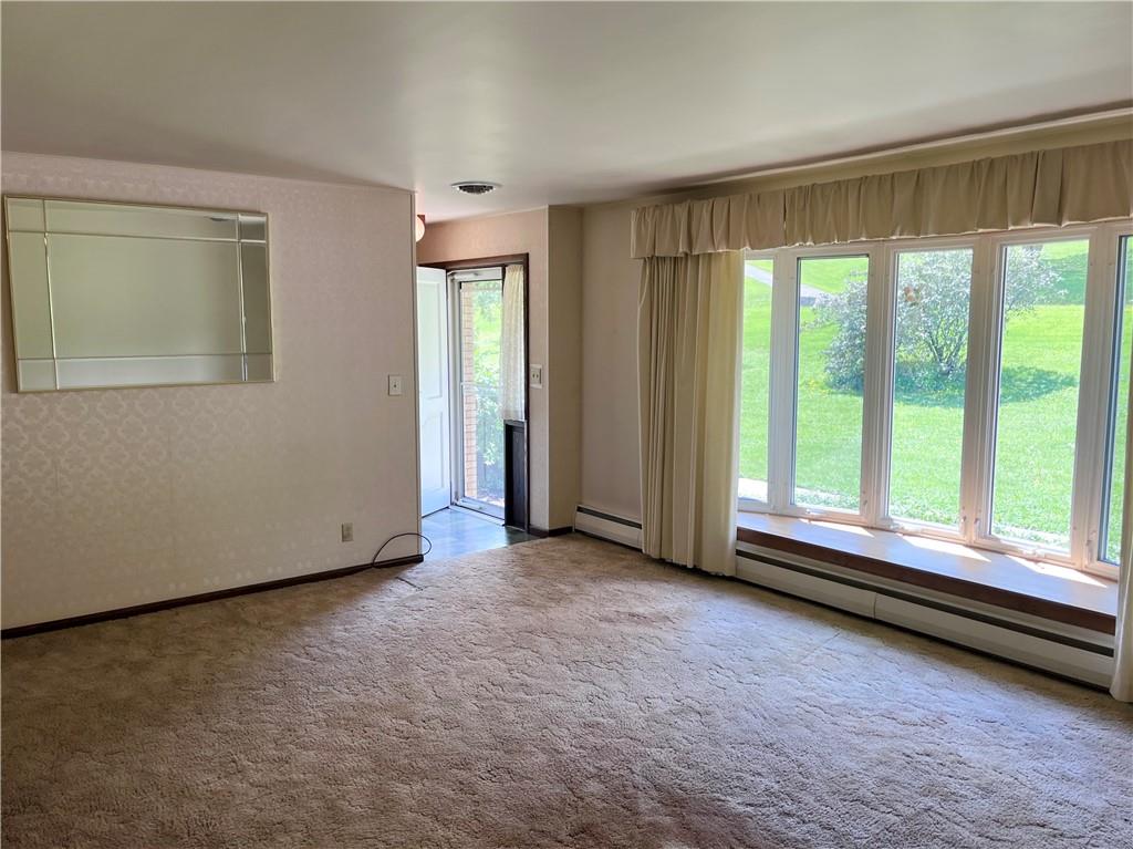 143 Schnur Road Butler, PA 16002 - Photo 31 of 50 a view of an empty room with a window