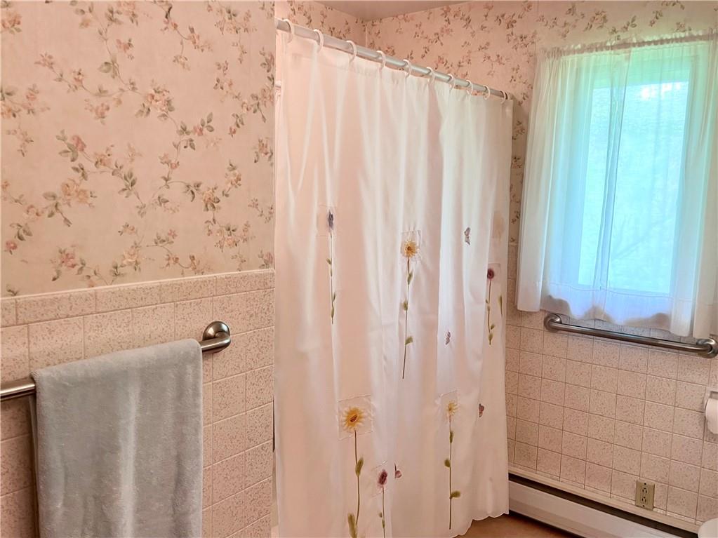 143 Schnur Road Butler, PA 16002 - Photo 37 of 50 a bathroom with a shower and a window