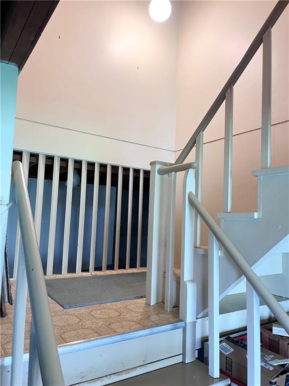 143 Schnur Road Butler, PA 16002 - Photo 45 of 50 a view of staircase with wooden floor and stairs