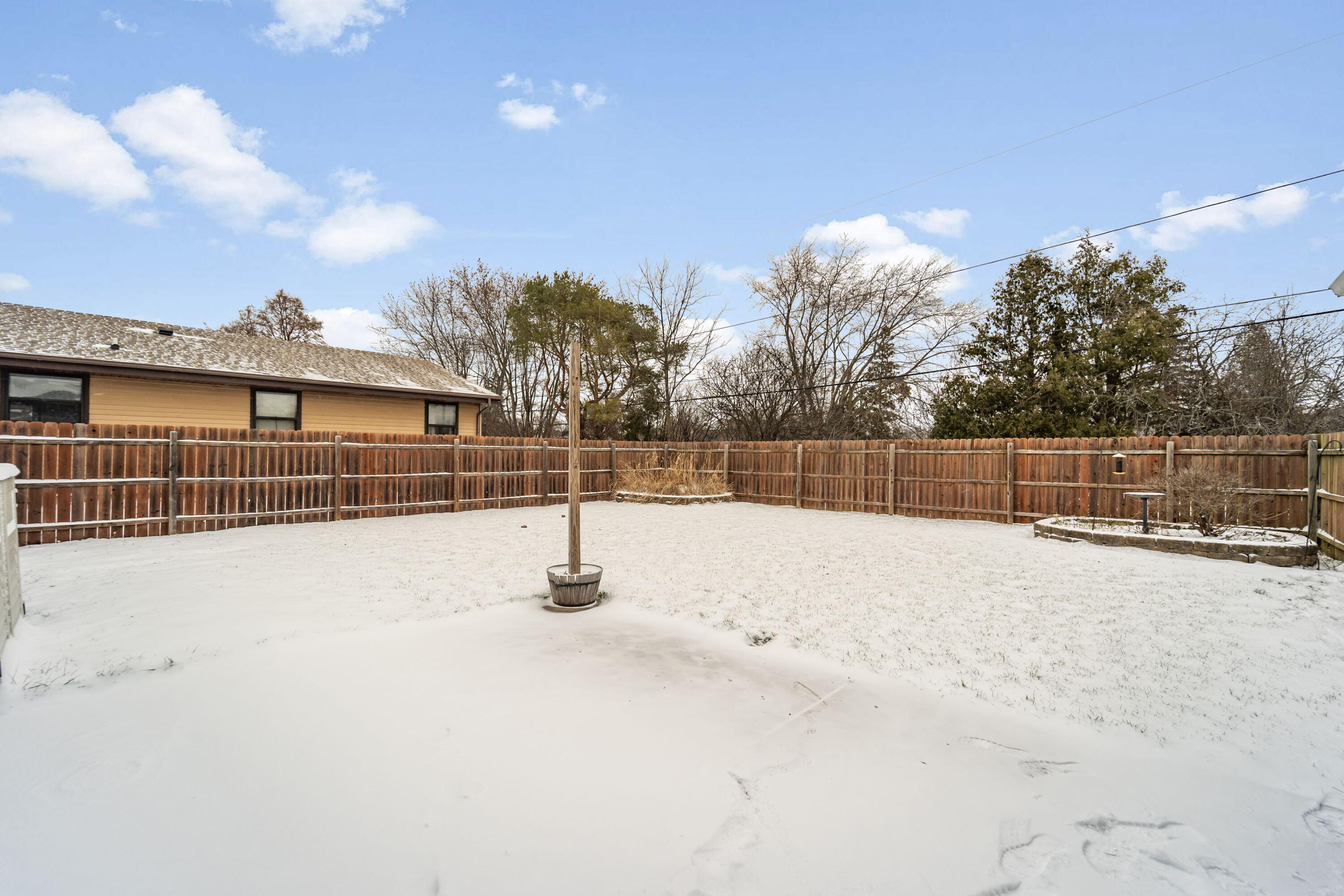 7230 South 38th Street Franklin, WI 53132 - Photo 16 of 17 Fenced Backyard