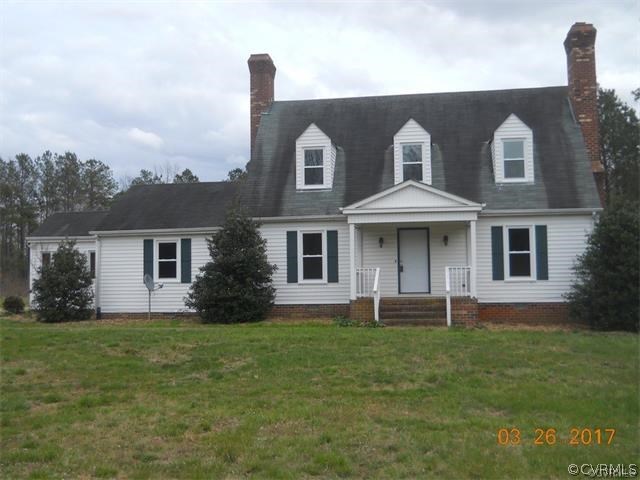 15519 Baltimore Road Dewitt, VA 23840 - Photo 2 of 13 a front view of a house with garden