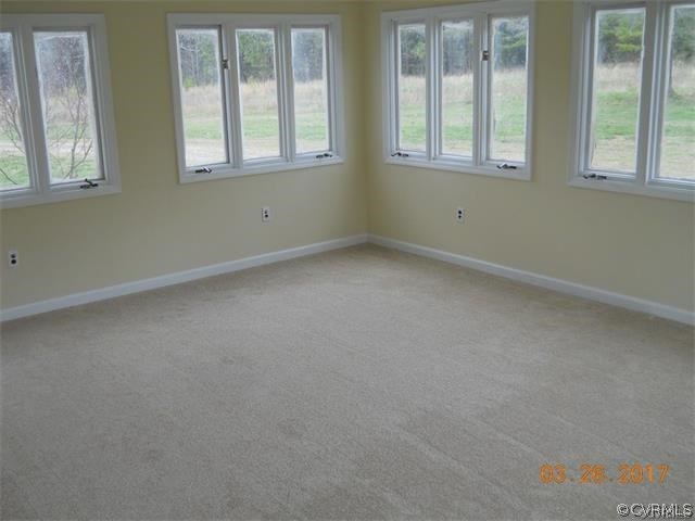 15519 Baltimore Road Dewitt, VA 23840 - Photo 8 of 13 an empty room with a window
