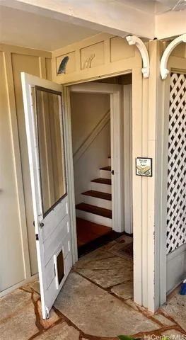 a bedroom with a bed and dresser