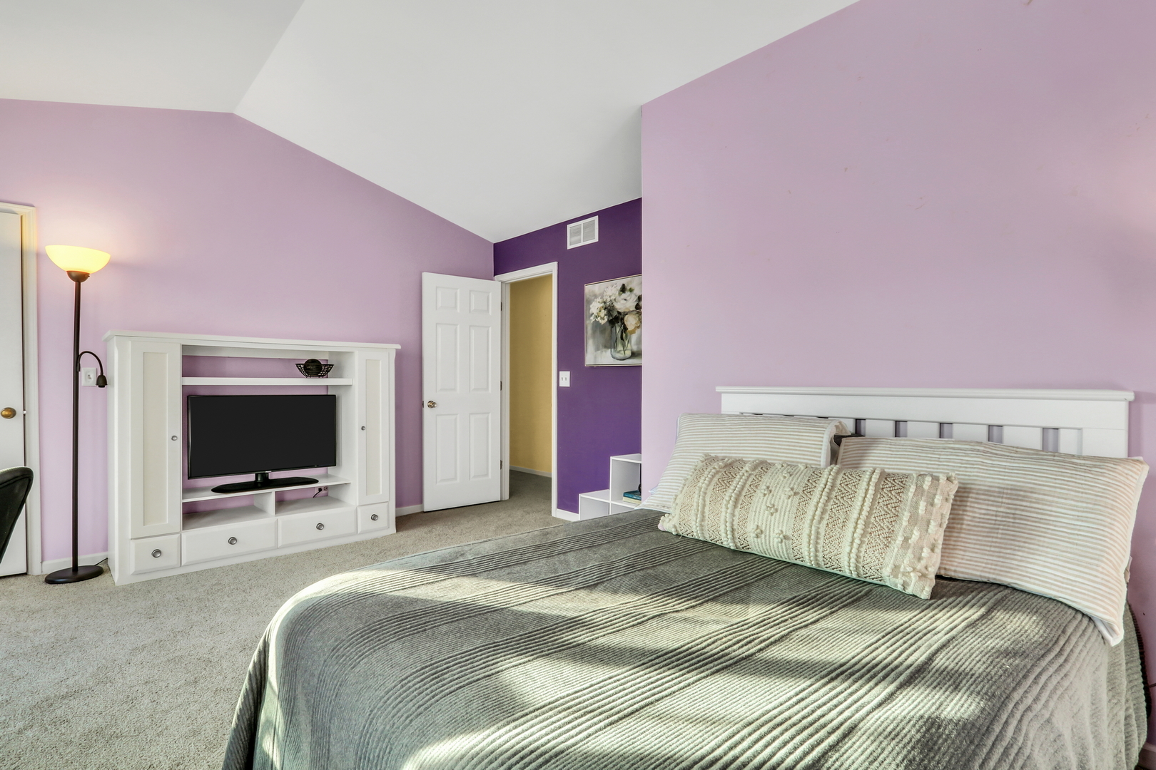 269 Braxton Way Grayslake, IL 60030 - Photo 26 of 38 a bedroom with a bed and a flat screen tv